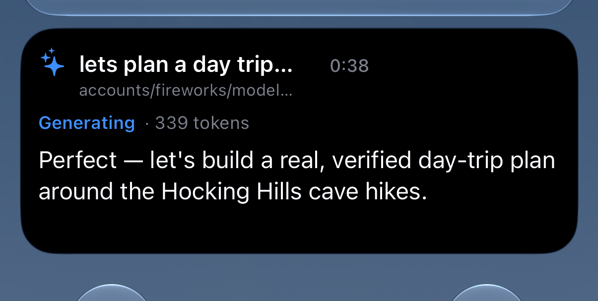 A Live Activity showing background generation progress in HollmChat